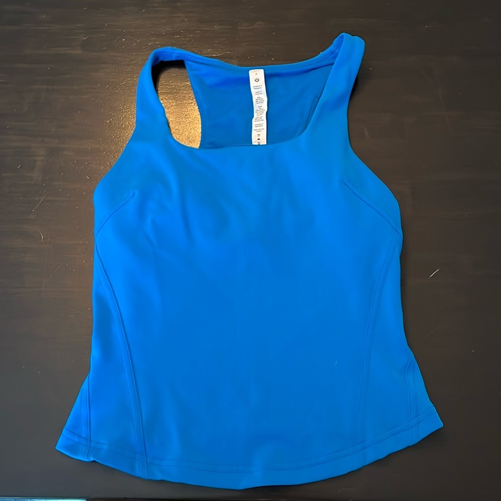 NWOT Lululemon tank top with built in bra. Size 4. Never worn.